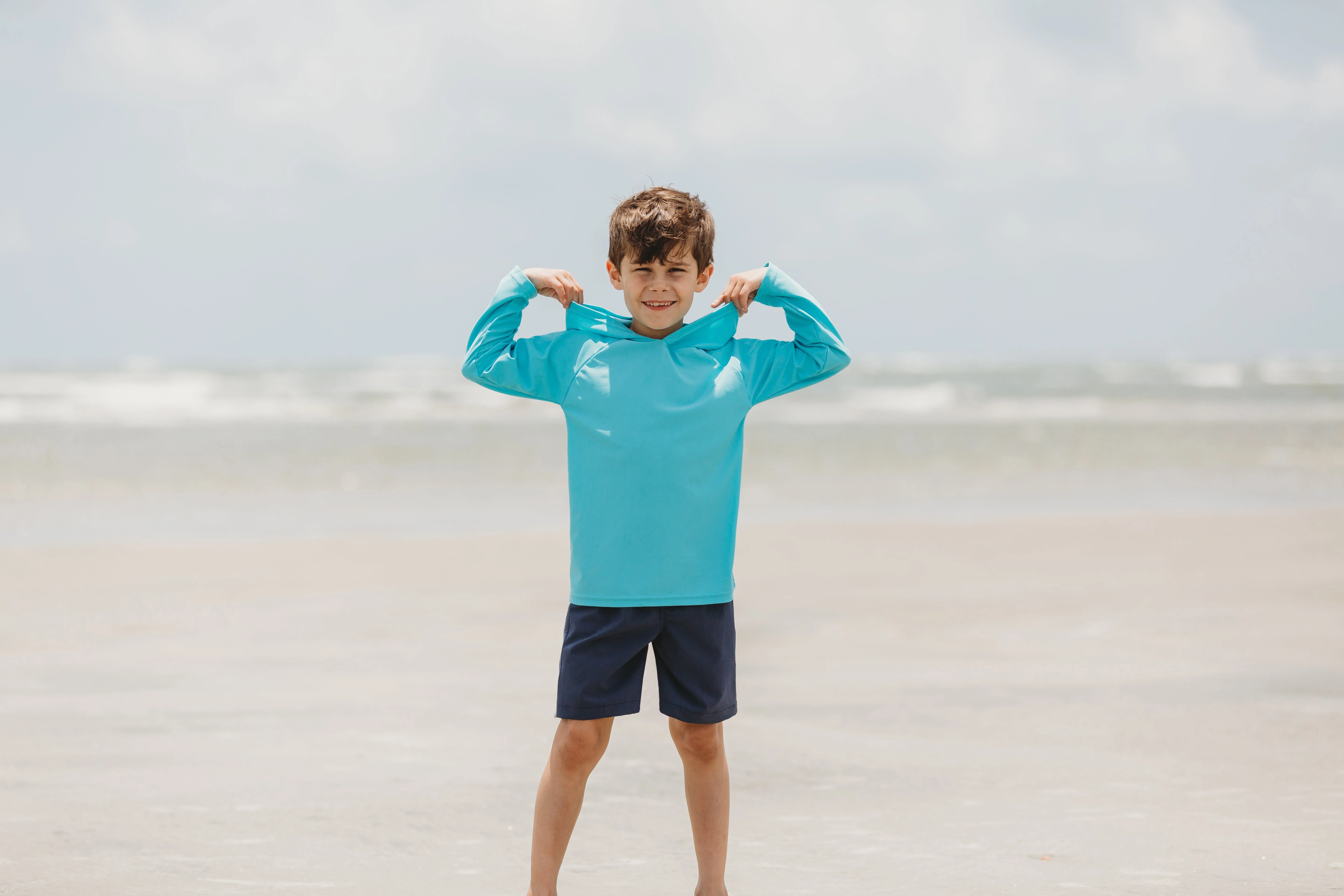 Boys UPF 50+ Soft Stretch Club Swim Trunks  - Above The Knee Fit | Red - Remutear